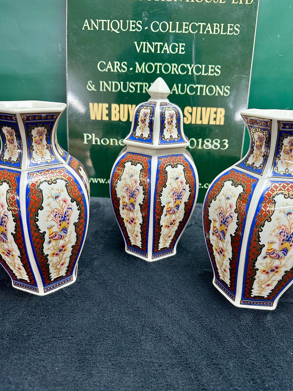 Lot 49: A Three-Piece Hexagonal Porcelain Garniture Set with Imari Style Decoration