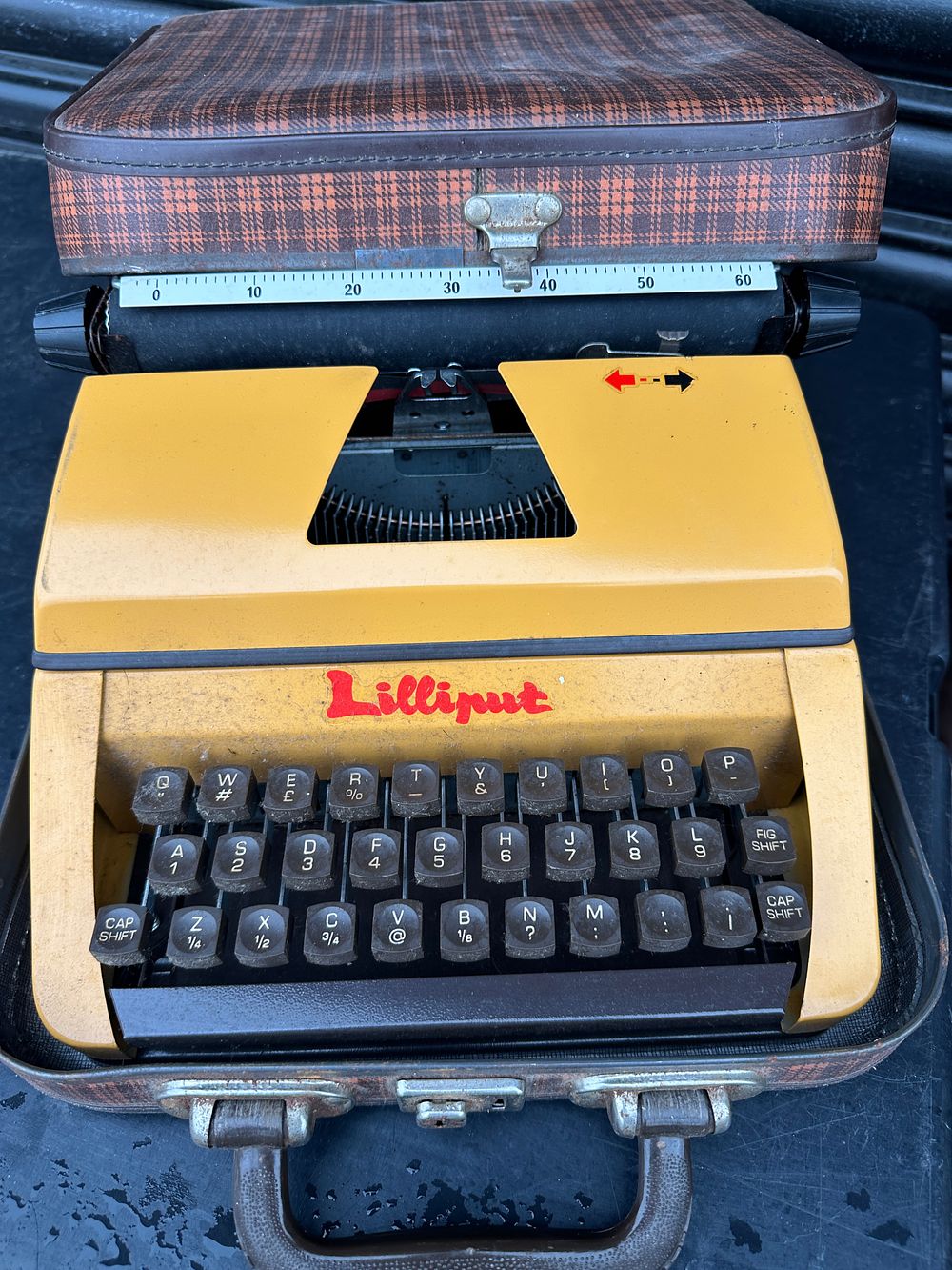 Lot 340: A Mid-20th Century Lilliput Portable Toy Typewriter With Tartan Case