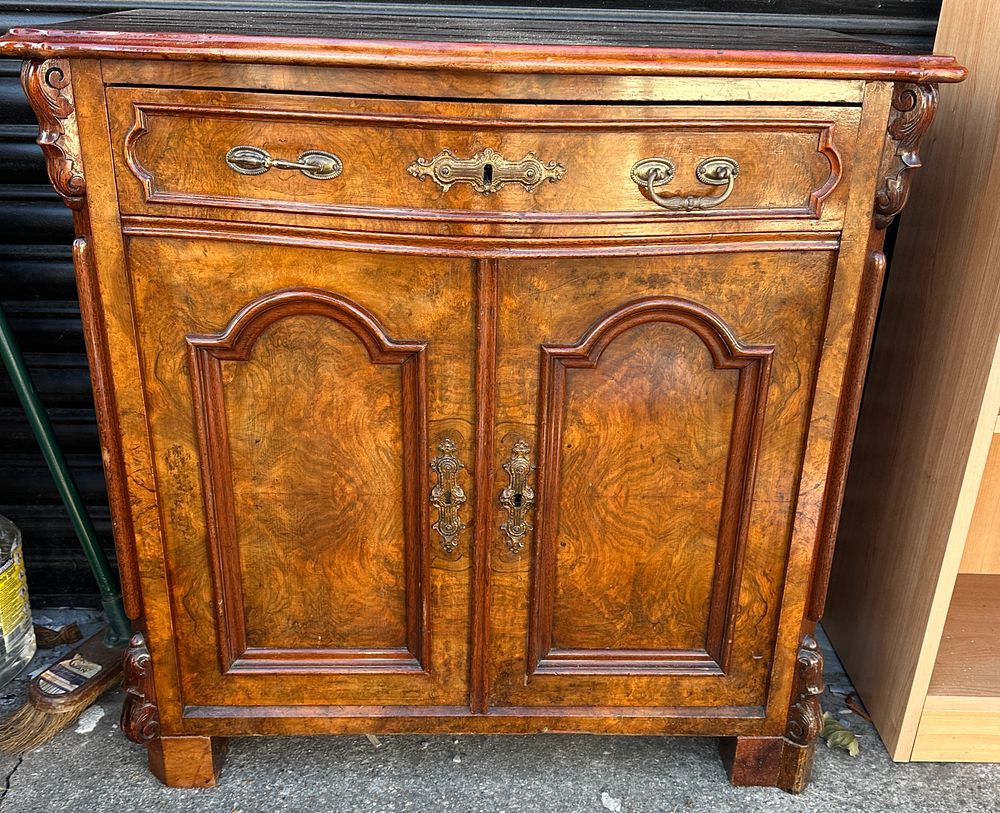 Lot 46: A  French Style Walnut Veneer Cupboard, with decorative metal hardware