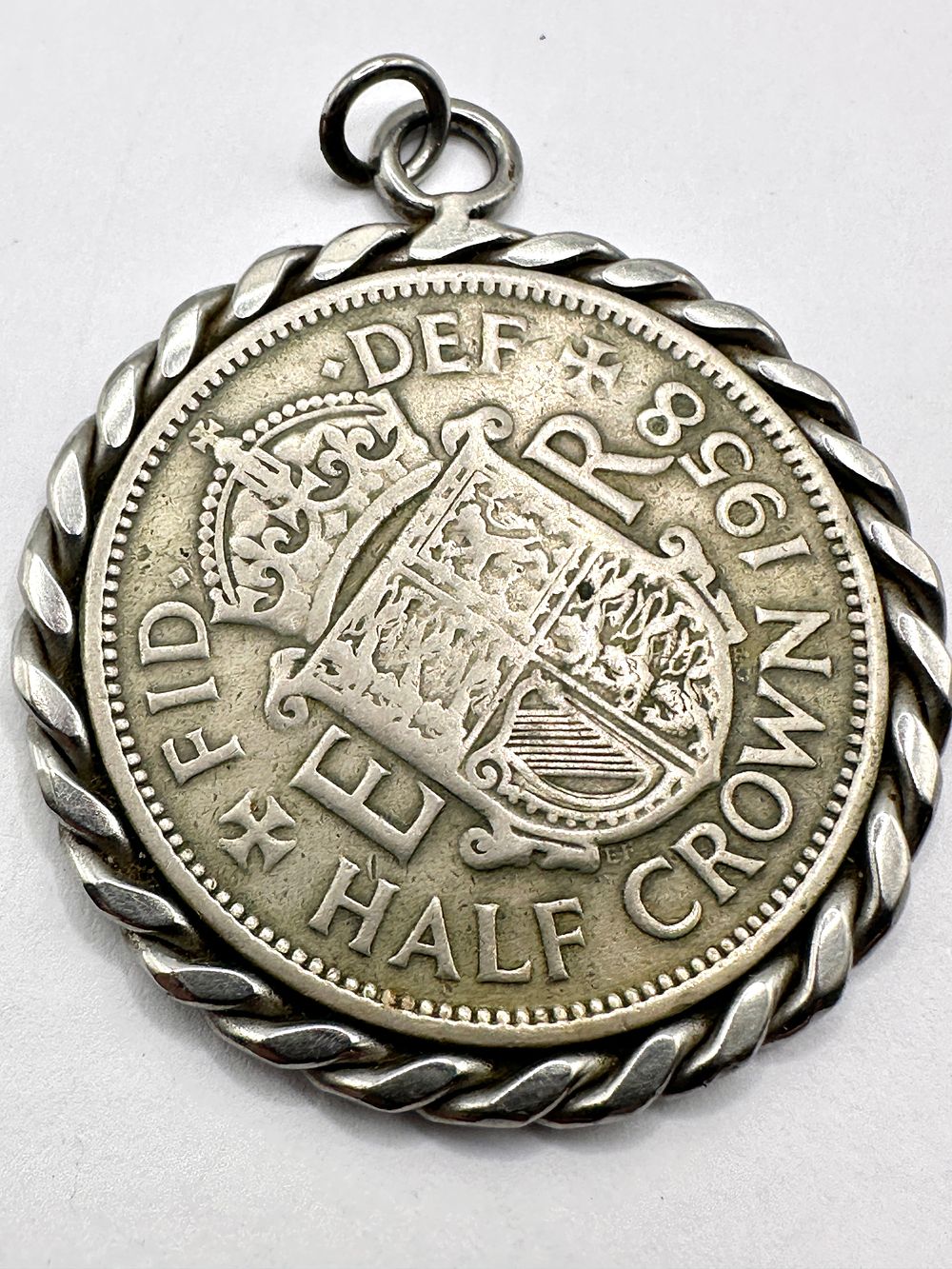 Lot 57: A 1958 Elizabeth II Half Crown Coin Pendant