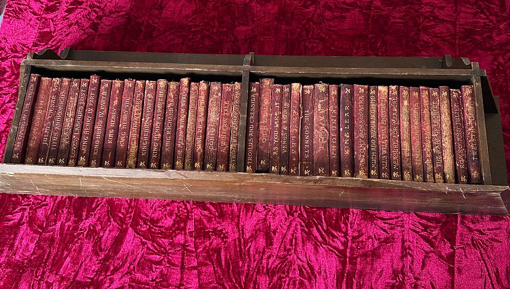 Lot 186: A Multi-Volume Set of Miniature Shakespeare Works with Wooden Display Shelf