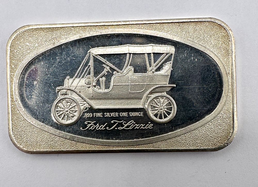 Lot 15: A .999 Fine Silver One Ounce Ford T-Lizzie Bullion Bar
