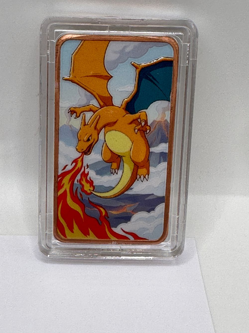 Lot 86: A 1oz Copper Pokémon Commemorative Ingot Featuring Charizard