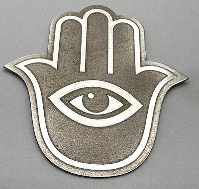 A 999 Fine Silver Hamsa Plate. A contemporary small plate or charm in the form of a Hamsa, also 