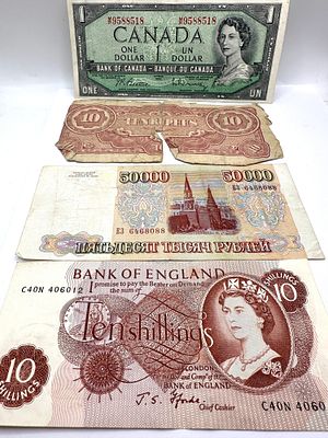 A Collection of Banknotes, Canada, Burma, Russia, and the UK. A collection of international 