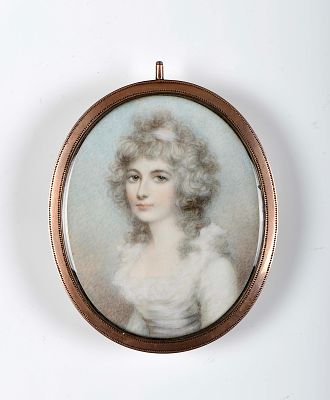 Portrait of a lady. miniature on ivory gilt metal frame, bnack side with blue, white and gilt 