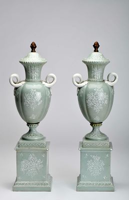 A pair of urns with covers. Sanson porcelain "Celadon" decoration with white relief "Flowers" 