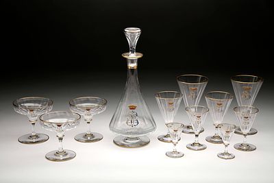 Part of a glassware service. crystal comprising a bottle with a stopper, 2 water glasses, 2 red 