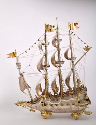 A nef. silver and gilt silver sculpture Hull with decoration en relief "Marine figures and 