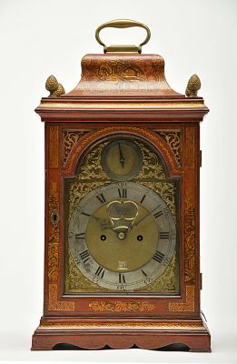 A table clock. George III (1760-1820) lacquered oak case "Chinoiseries" gilt decoration 