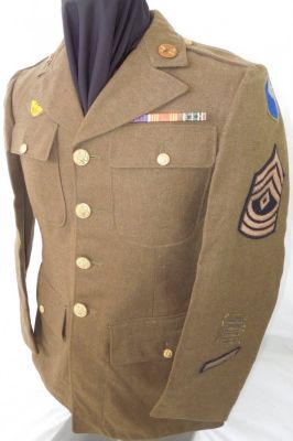 Soldiers from the 29th Division, also known as the Blue & Gray, at