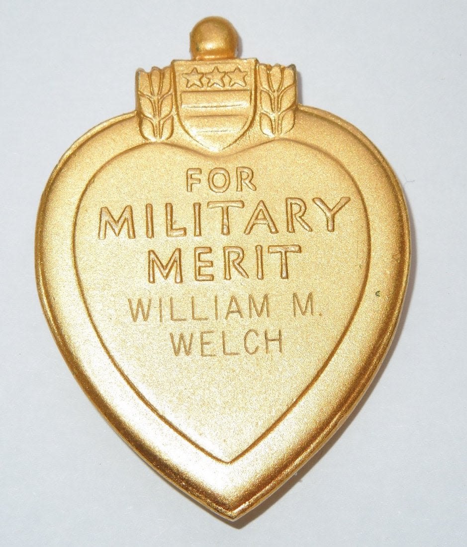 Lot 117A: Korean War 7th & 31st Infantry Named Purple Heart Medal