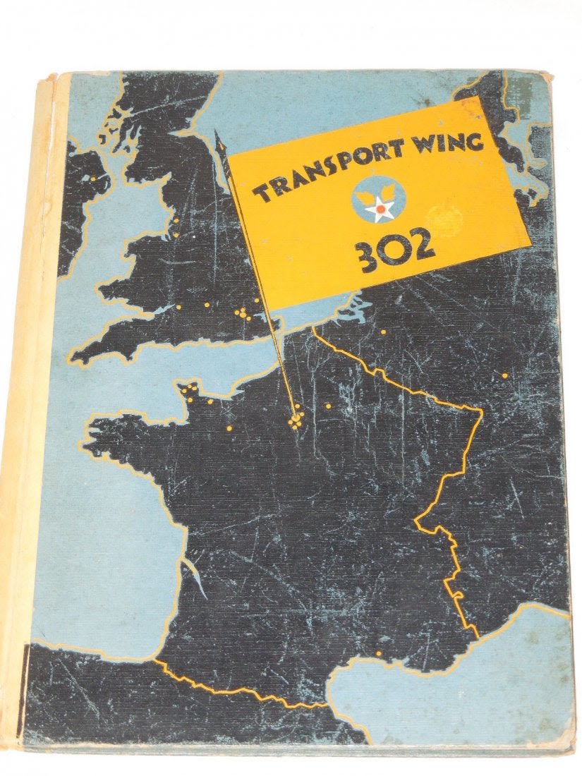 Lot 217: WWII 302nd Transport Wing Yearbook Group AAF