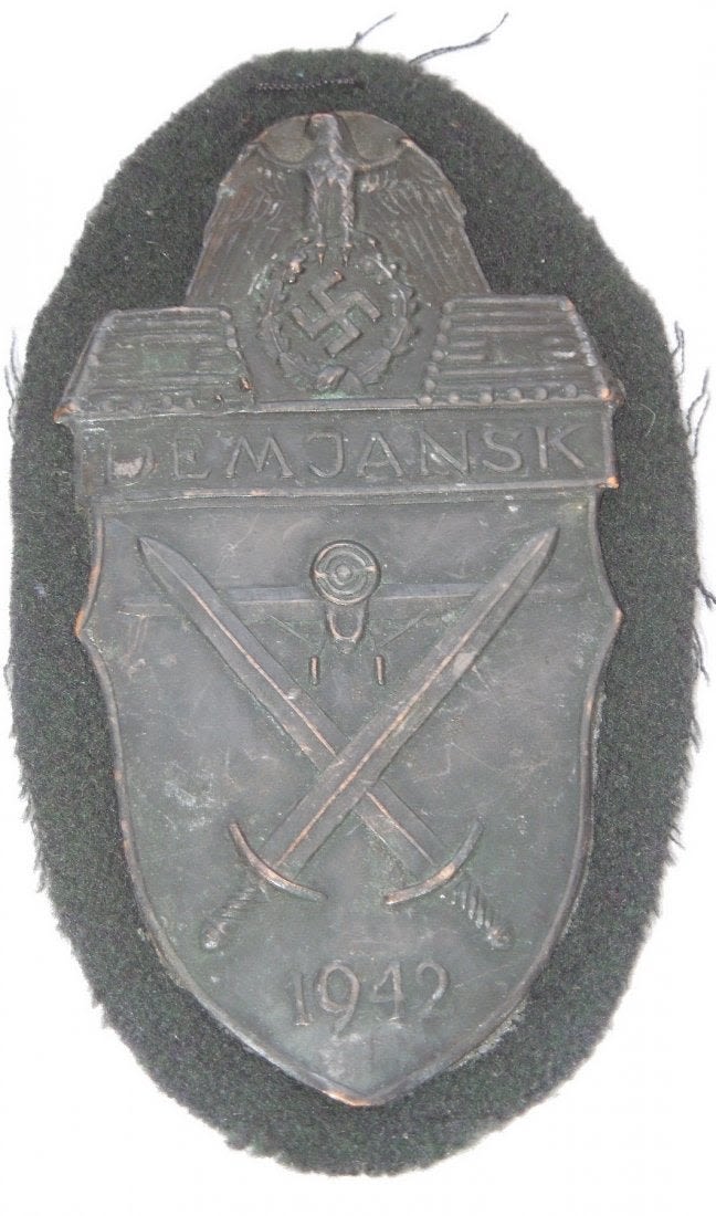 Lot 253A: WWII German Wehrmacht Demjansk 1942 Shield Badge