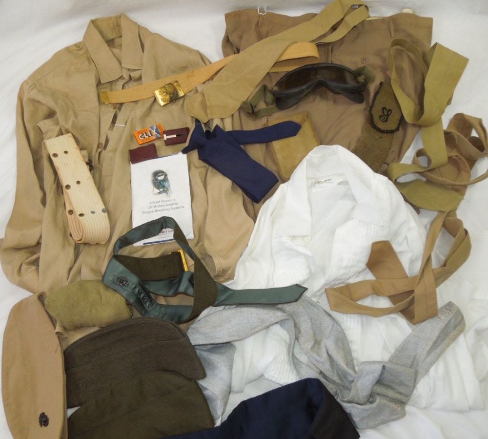 Lot 262: WWII - Vietnam Navy USMC AAF Goggles Caps Ties Lot Pant