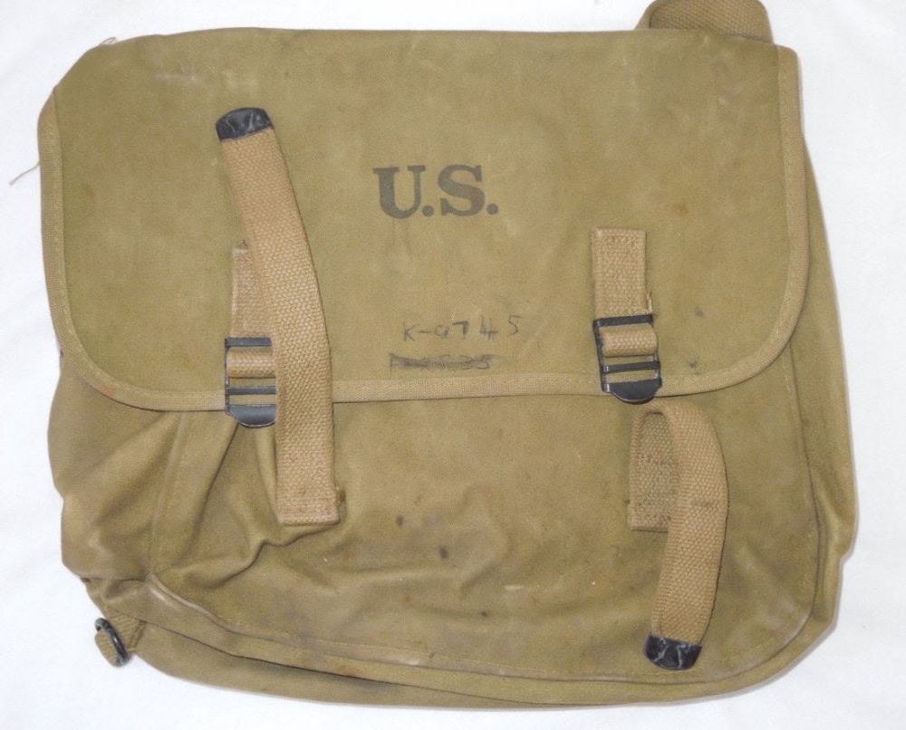 Lot 276: WWII 1942 Rubberized US Army Named Musette Bag