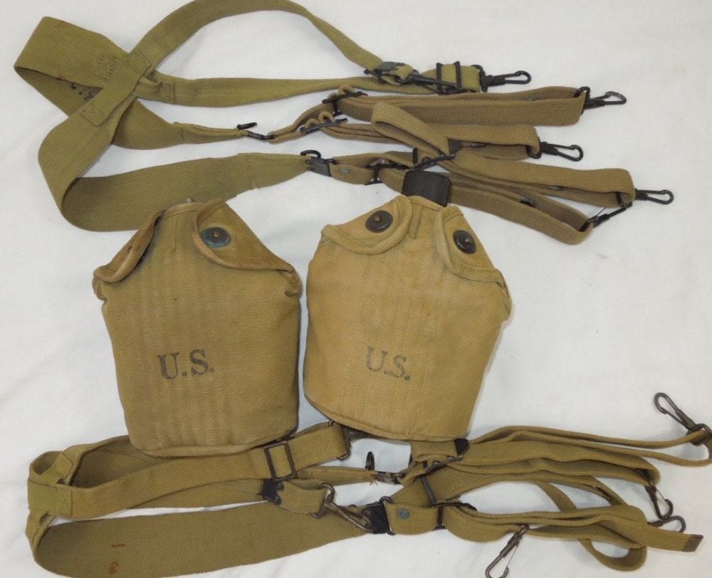 Lot 292: WWII US Military Canteens Suspenders Combat Harness Lot