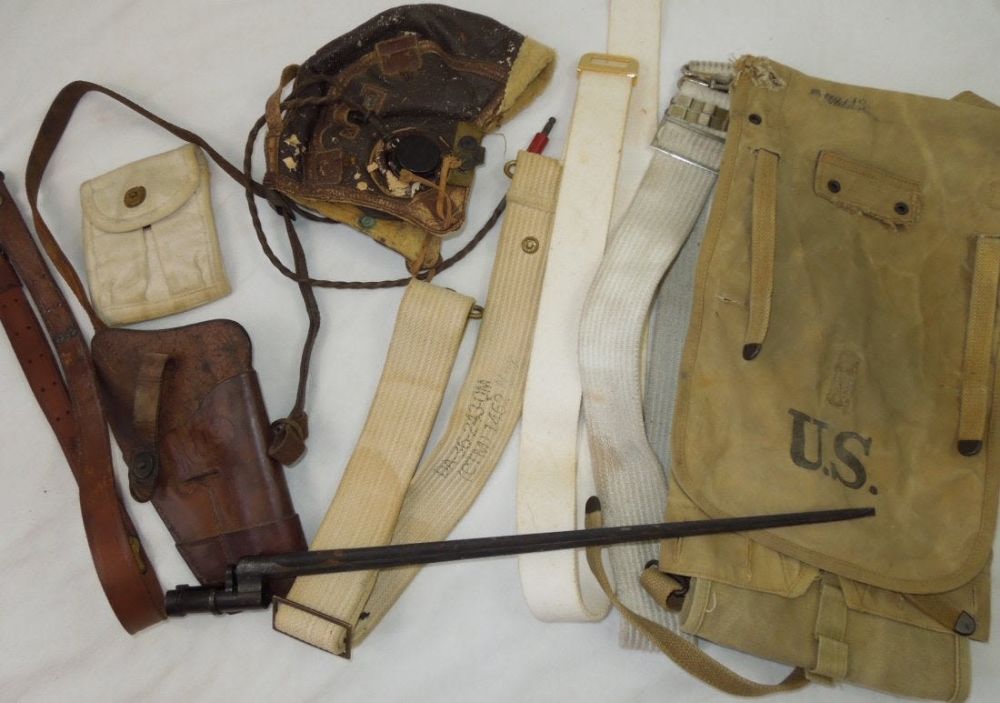Lot 303: WWII - 50s Military Field Gear Holster Bayonet Lot