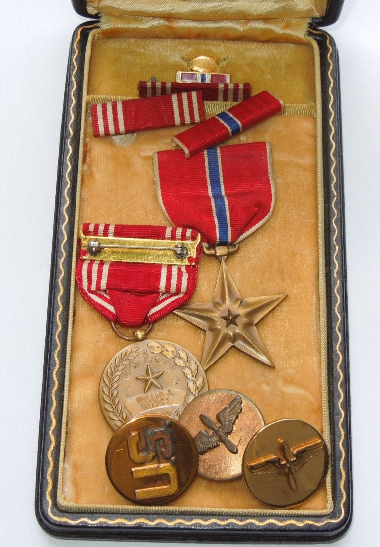 Lot 310: WWII US 410th Bomb Group Named Medal Bronze Star Lot