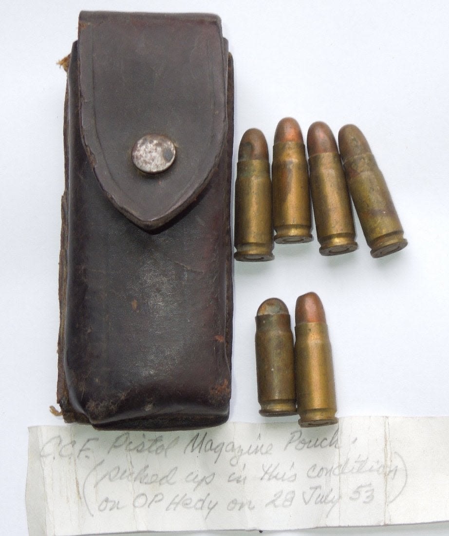 Lot 335: Korean War Captured Chinese Magazine Pouch and Bullets