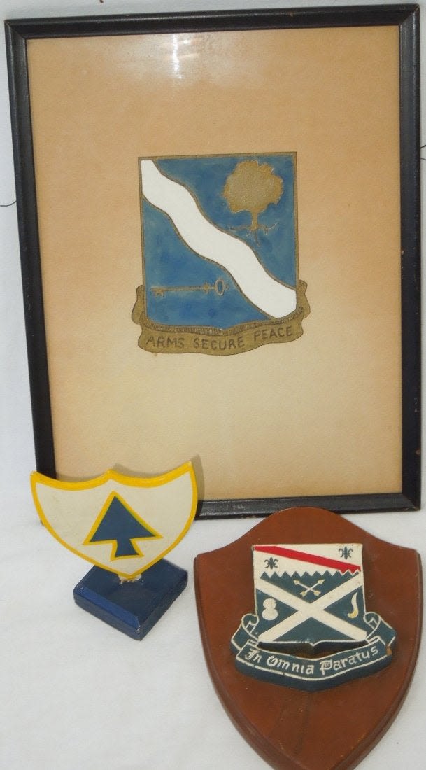 Lot 390: WWII - Korea US 143rd 26th 18th Infantry Wall Hangers