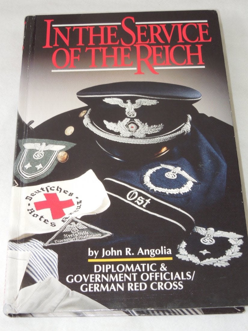 Lot 512: In The Service of the Reich Angolia Reference Book