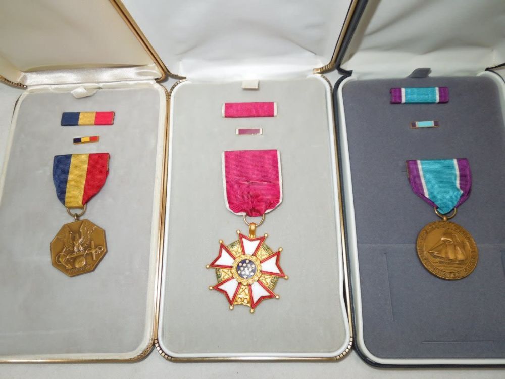 Lot 305: Boxed NMCM Coast Guard DSM Legion of Merit Medals Lot