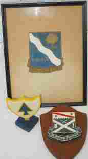 Lot 310: WWII - Korea US 143rd 26th 18th Infantry Wall Hangers
