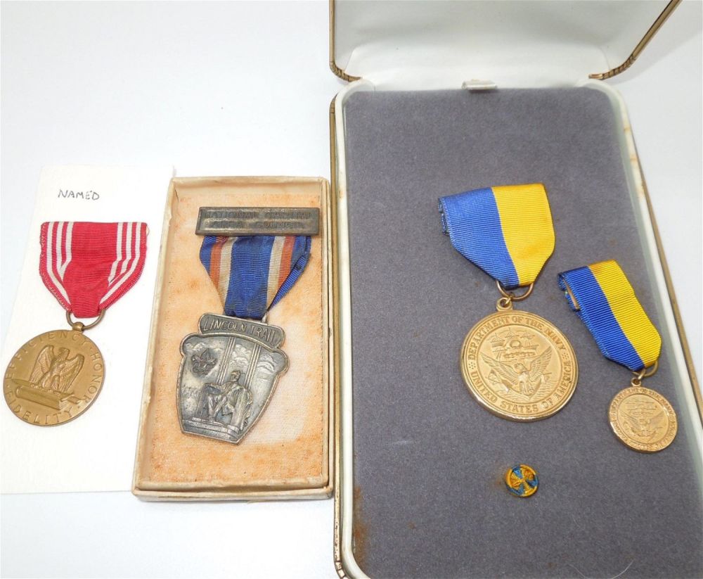 Lot 182: WWII - 60s Medal Named Navy Public Service Lincoln Lot of 3
