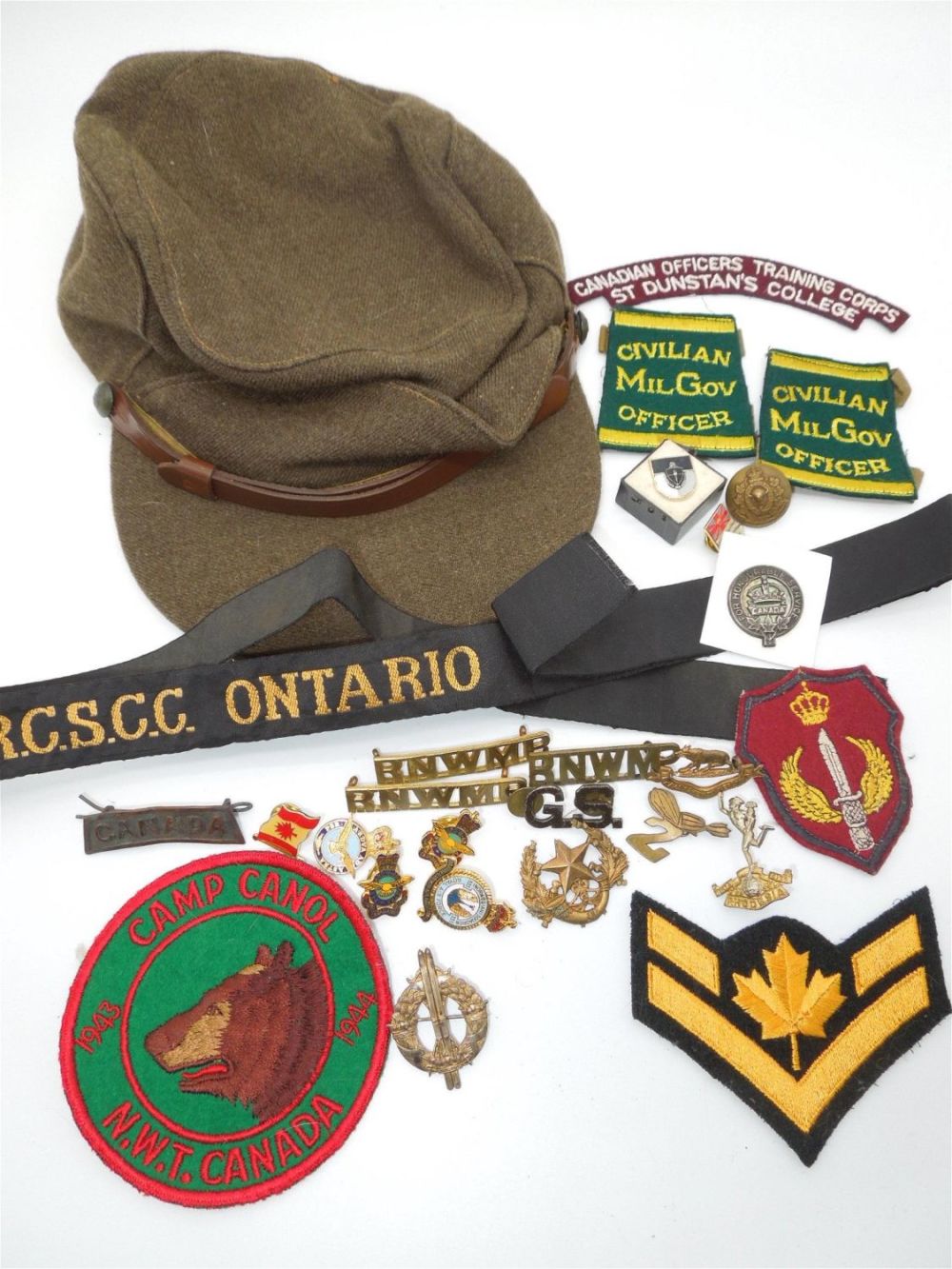 Lot 198: WWII - Post War Army & Navy Canadian Military Pins, Badges & Hat Badges