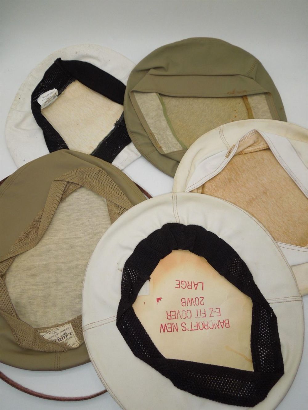 Lot 224: WWII Era Lot USN Navy Vinyl Visor Cap Hat Rain Covers