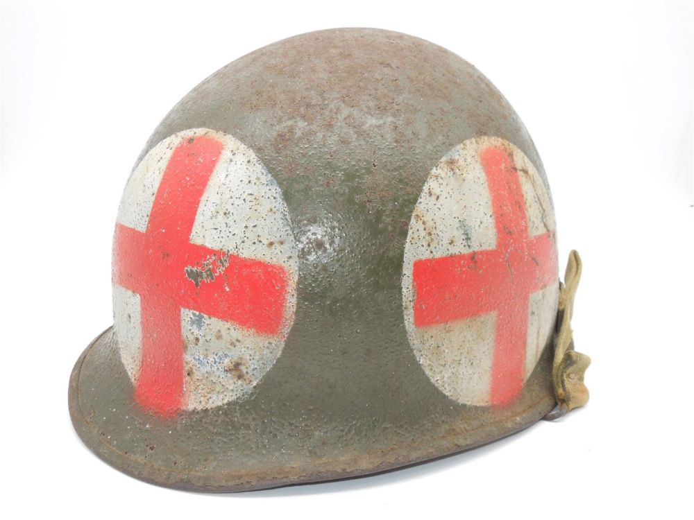 Lot 250: Korean War 4 Panel US Army Medic M-1 Helmet