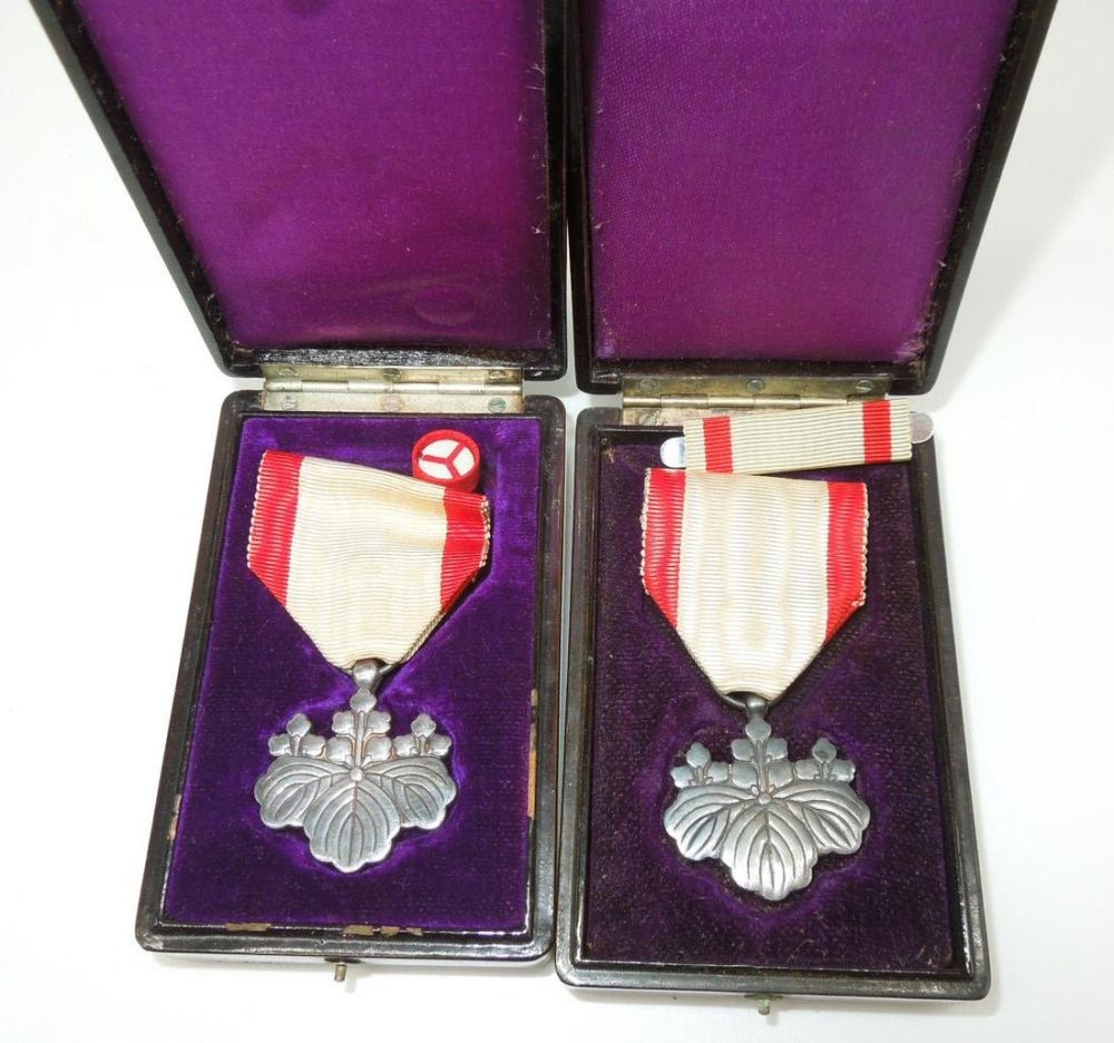 Lot 294: Japanese Order of Rising Sun 8th Class Pawlonia Medal, Ribbon & Rosette Lot of 2