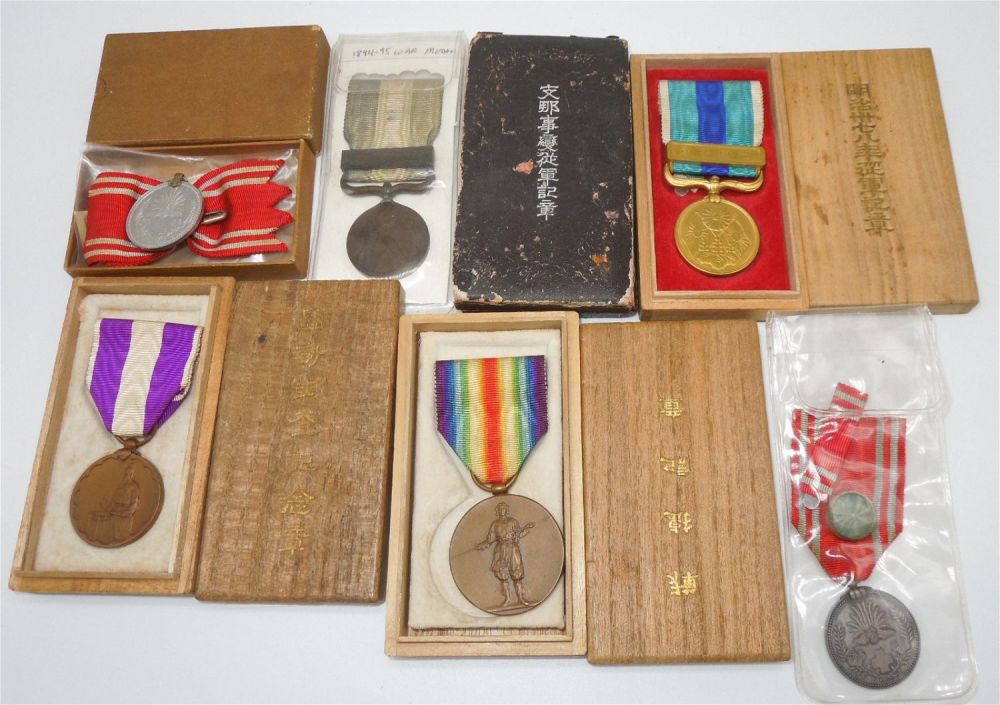 Lot 311: Japanese Medals 1894 China Camp, 1904 Russo War, Victory, Womens RC & National Census