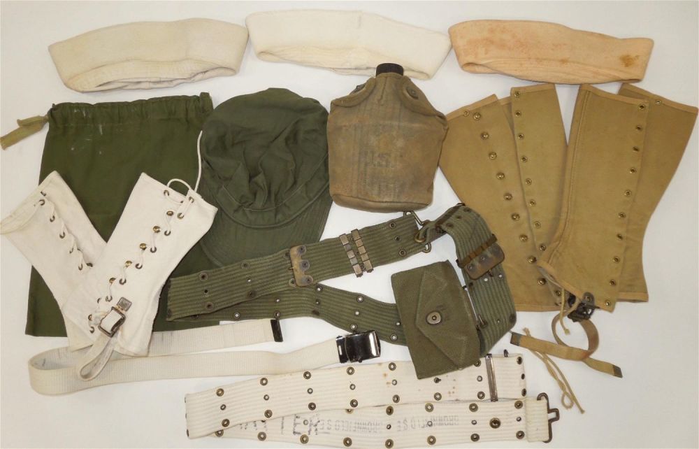 Lot 361: WWII Lot US Army Navy Field Gear Canteen Leggings Belts Caps