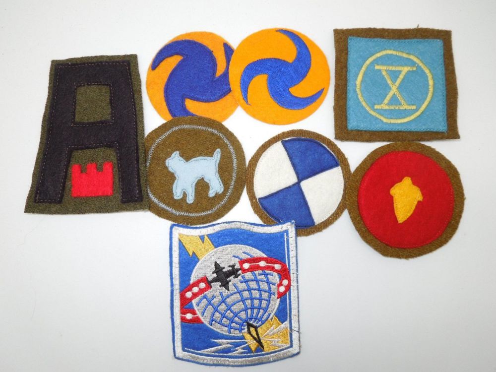 Lot 157: Lot of US Army WWI - WWII Reproduction Wool Patches Insignia