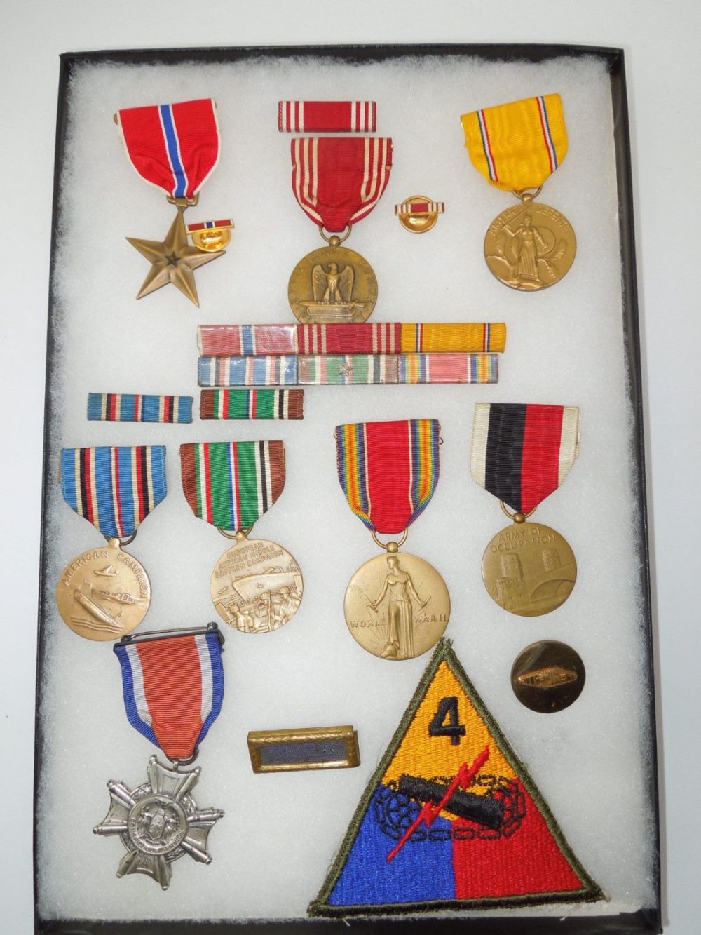 Lot 168: Named WWII US 4th Armored Division CSC Bronze Star Medal Group & Research
