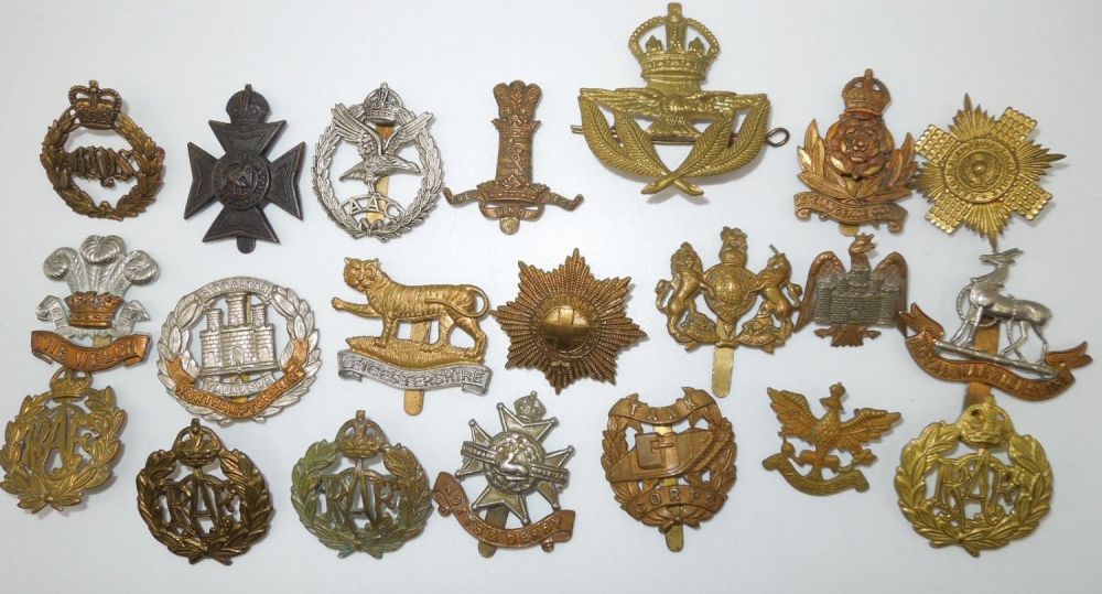 Lot 203: WWII - Post War British & Canadian Military Cap Badges Insignia Lot
