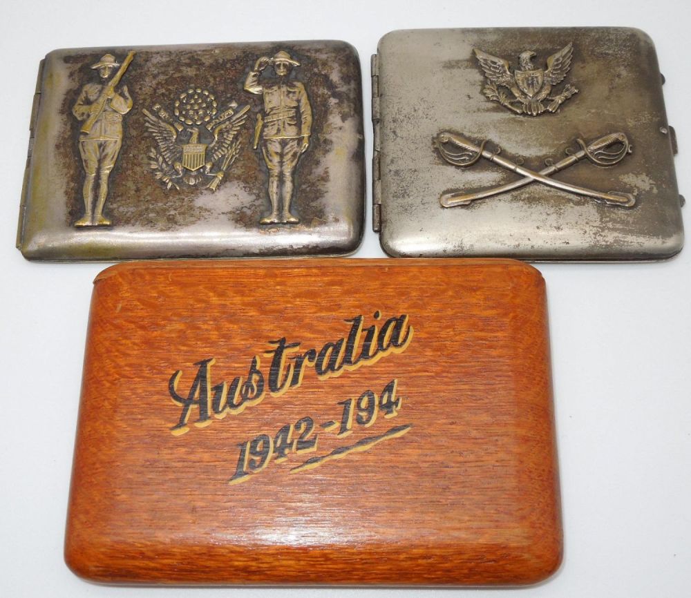 Lot 231: WWI - WWII US Military Cigarette Cases Army Doughboy Cavalry Australia Lot
