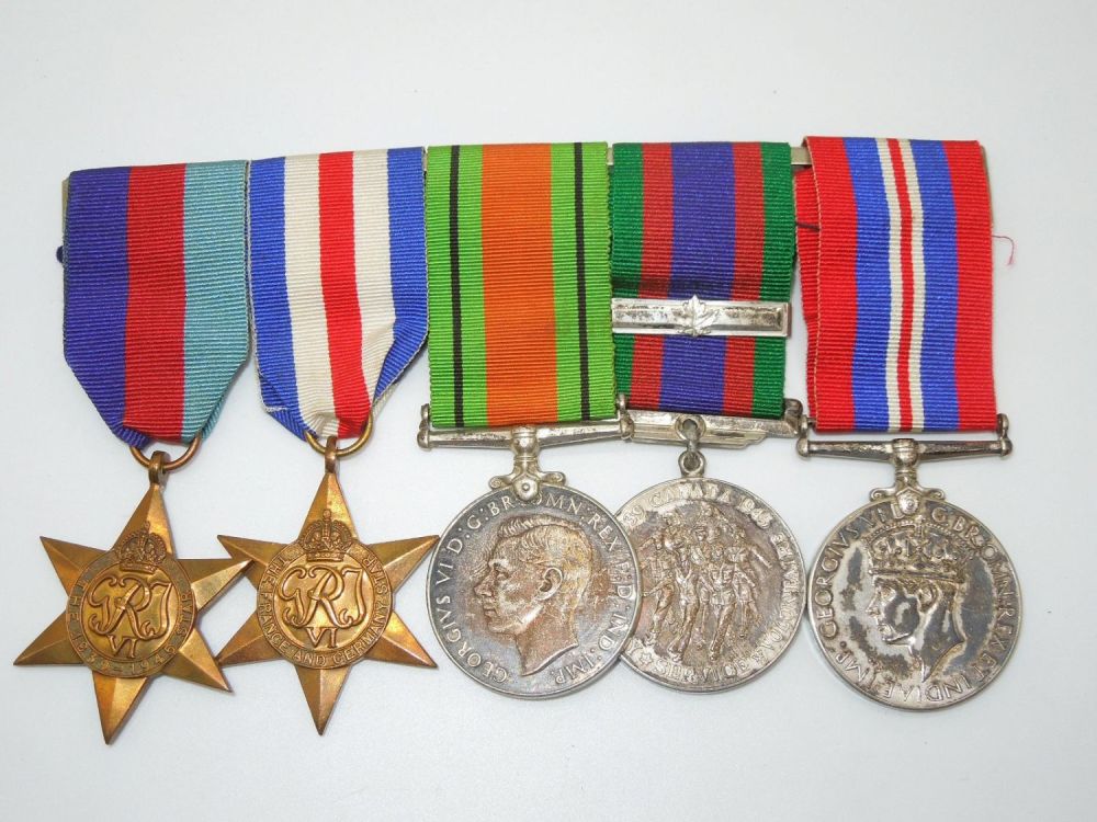 Lot 253: WWII British or Canadian Medal Bar 5 Count Star, France Germany, Defense, Volunteer