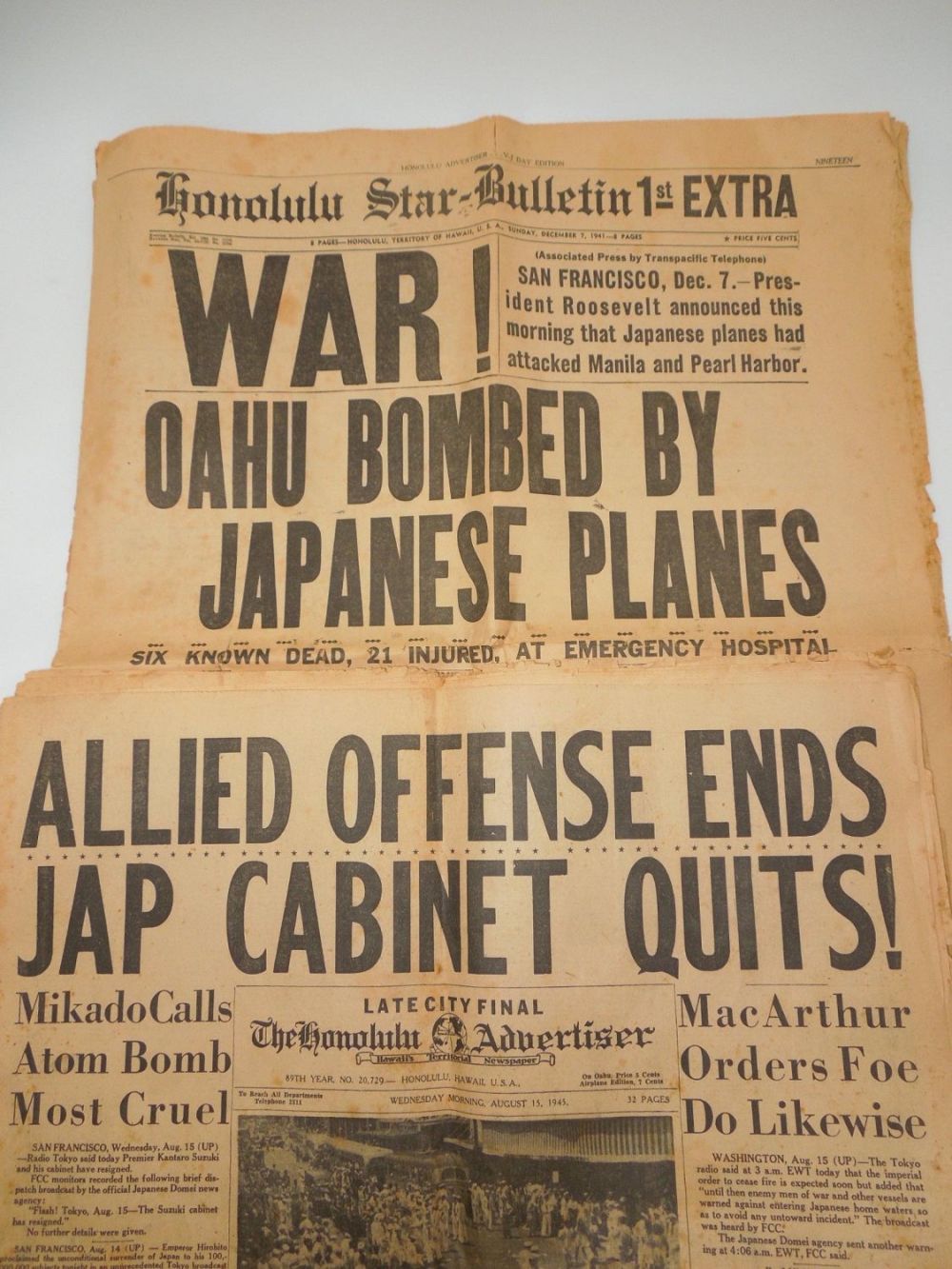 Lot 268: WWII V-J Honolulu Star Bulletin Pearl Harbor Bombed & Victory Newspapers