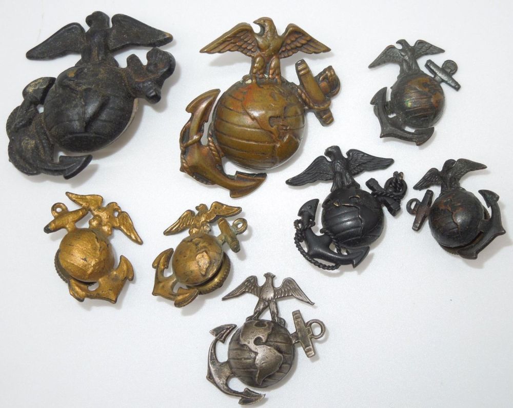 Lot 272: Lot of 8 WWII - Vietnam USMC EGA Badges