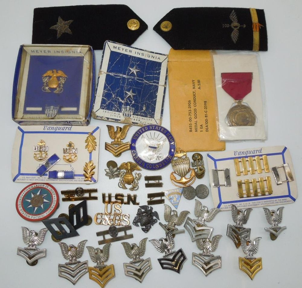 Lot 273: WWII - Modern US Navy Pins, Badges, Ranks, Medal, Boards Lot