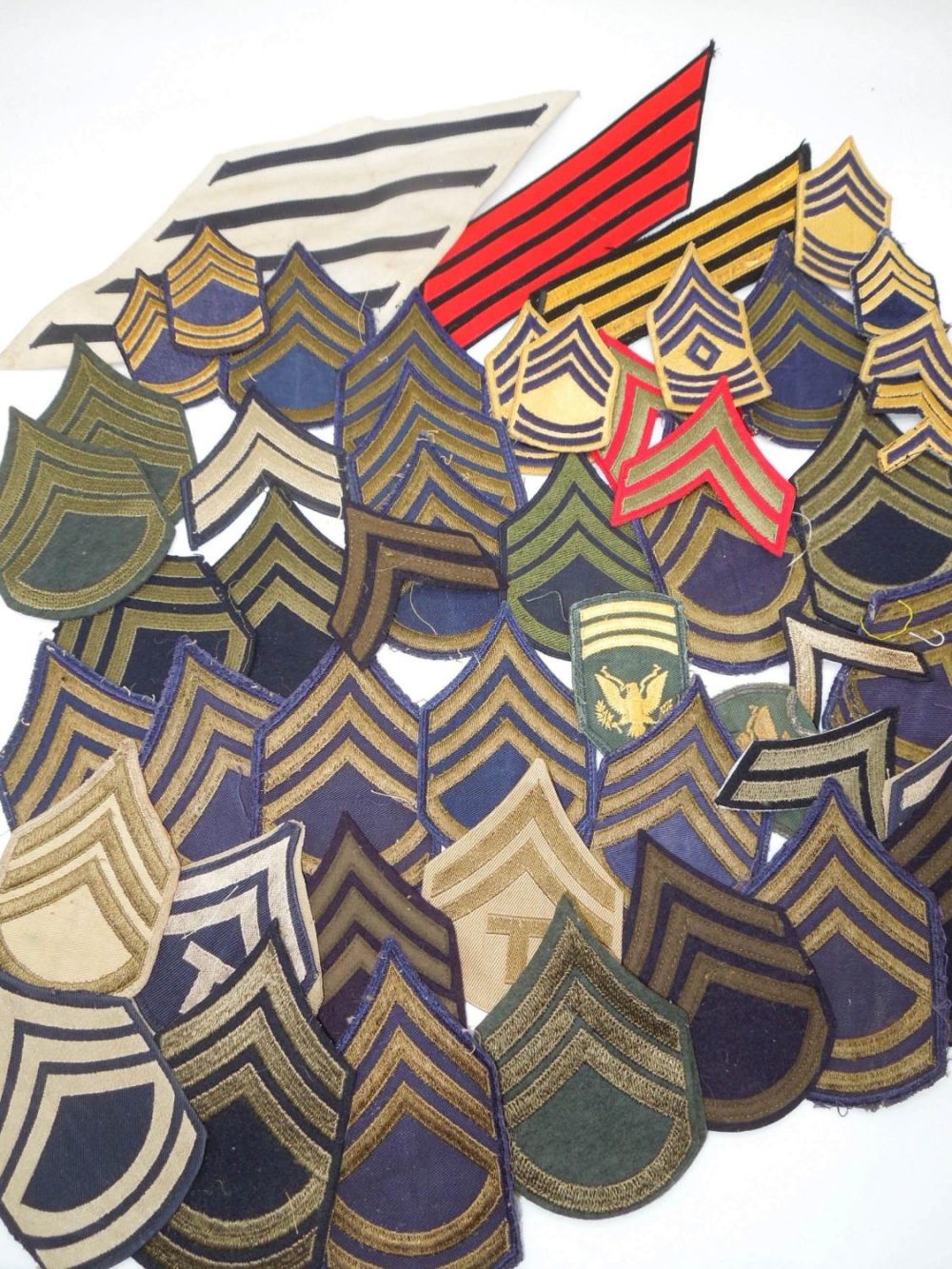 Lot 374: WWII - Korean War US Sergeant Rank Stripes Insignia Chevrons Lot
