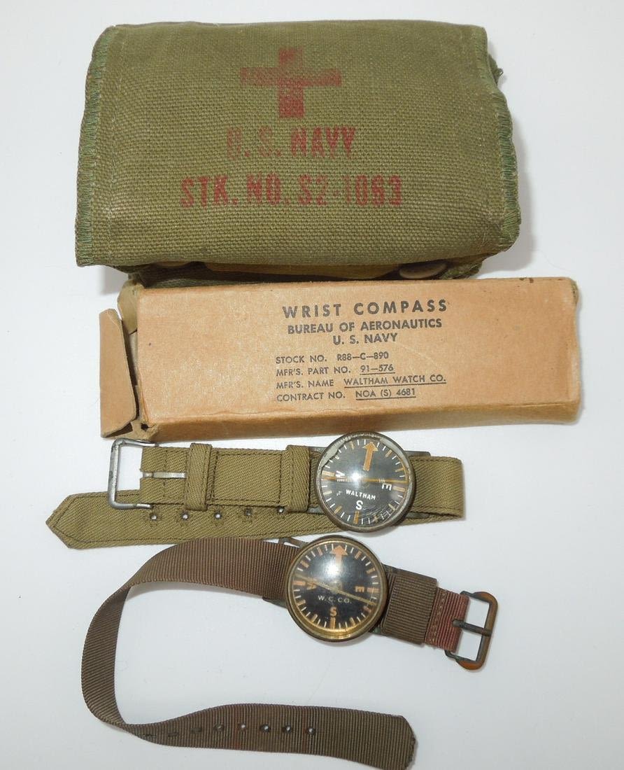 Lot 460: WWII USN Navy Wrist Compass (2) & First Aid Kit Lot Can Opener Fire Starter Lot