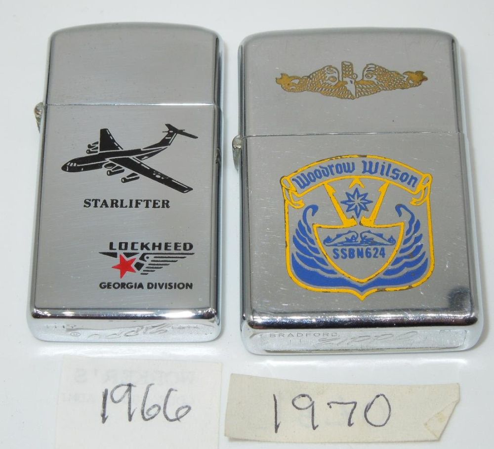 Lot 485: US Navy Air Force Lockheed Starlifter & USS Woodrow Wilson Submarine Zippo Lighters