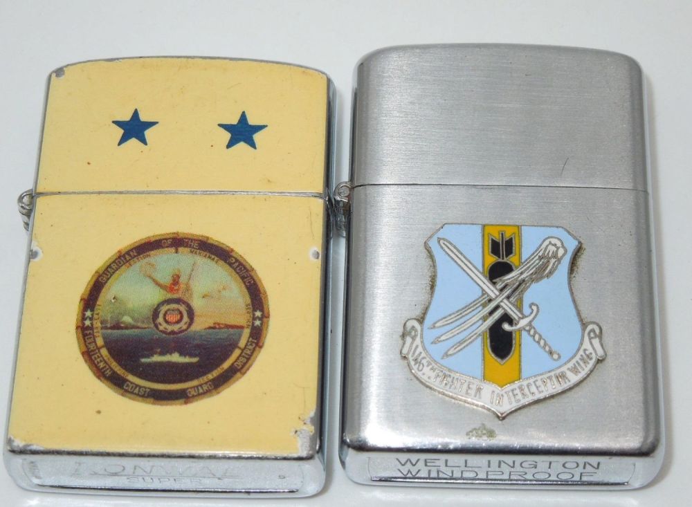 Lot 487: US Coast Guard Admiral & 146th Fighter Interceptor Wing Lighters Wellington Konwal