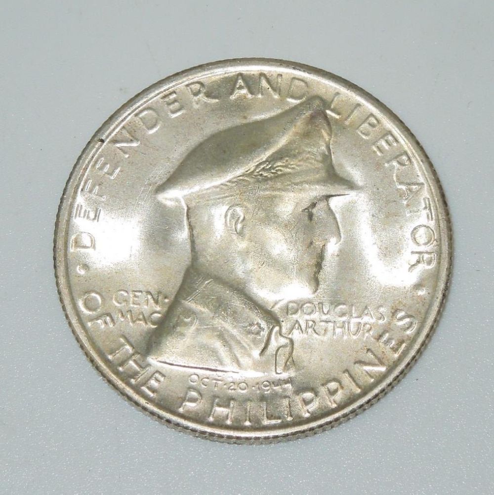 Lot 278: 1947 S Philippines General Douglas MacArthur One Peso Silver Coin