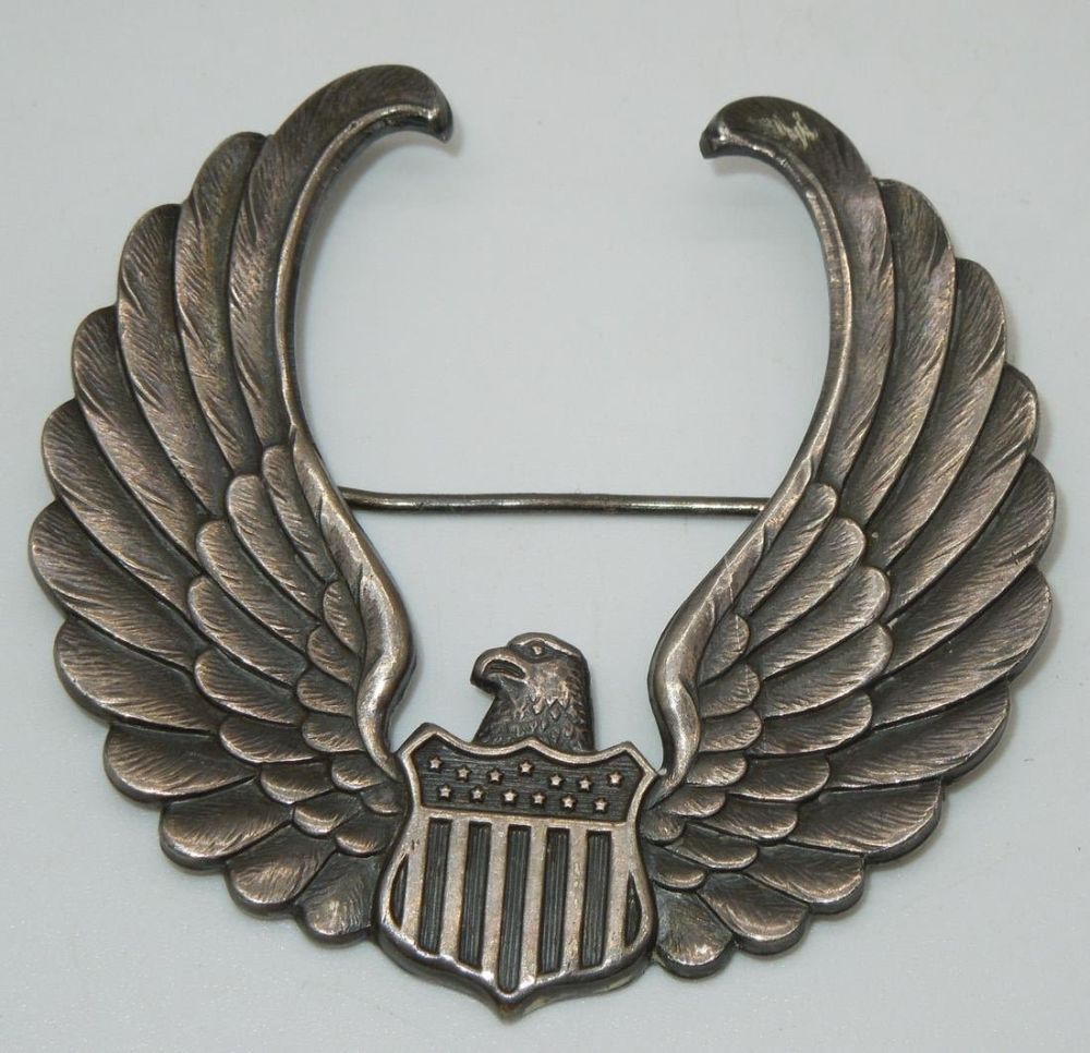 Lot 282: Original Sterling WWII CPT Civilian Pilot Training Instructor Cap Badge