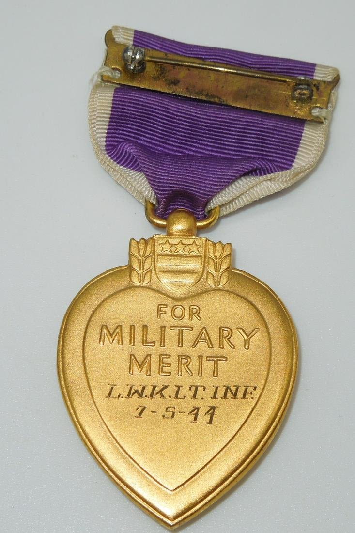 Lot 331: WWII 1944 Engraved US Army Purple Heart Medal